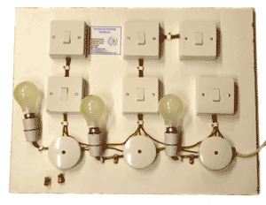This is one of the practical exercises on the Electrical Building Services course - boards carrying a combination of lighting circuits wired in 2 plate or 3 plate format where they can explore the various systems, add and remove components etc