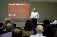 Martin Smith explaining how the engineering skills courses are constructed to the audience at T3