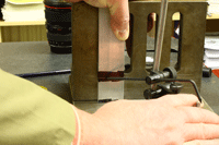 Candidates make a v-block on the engineering fitting skills course