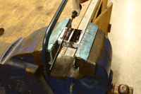 Candidates make a v-block on the engineering fitting skills course